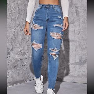 Ripped Raw Trim Skinny Jeans